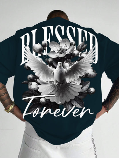 Person wearing a dark blue shirt with 'Blessed Forever' design featuring a dove and flowers.