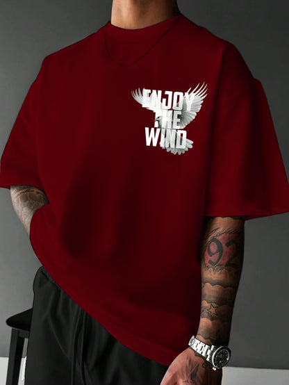 Red t-shirt with 'Enjoy the Wind' design on a gray background
