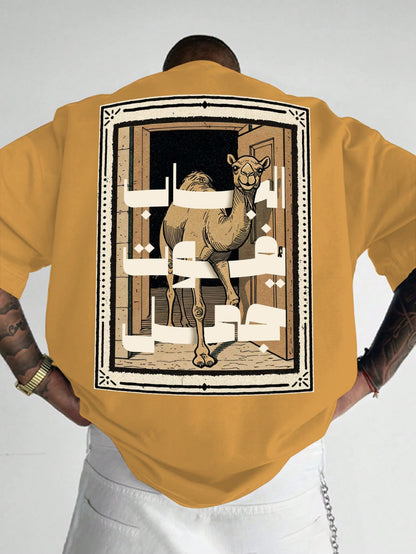 Person wearing a mustard yellow shirt with a camel graphic on the back against a white background