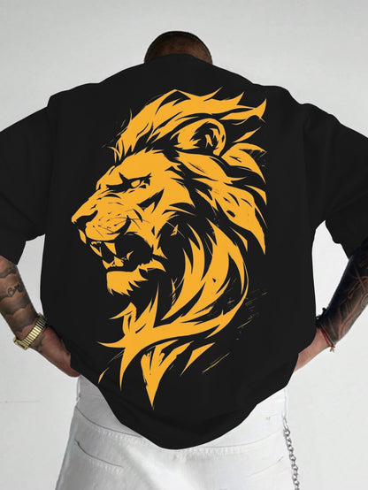 Person wearing a black shirt with a yellow lion design on the back against a white background