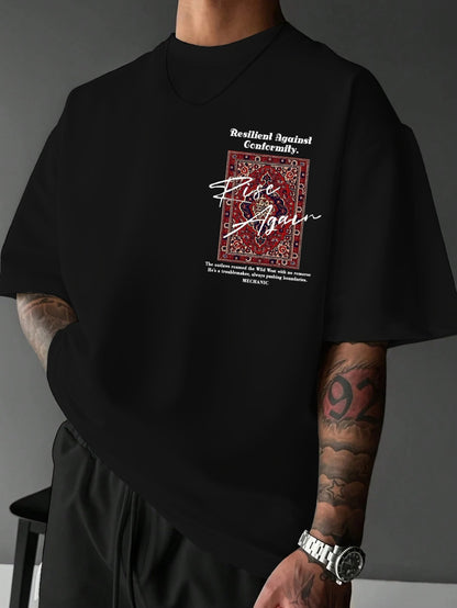 Person wearing a black t-shirt with a graphic design and text on a gray background