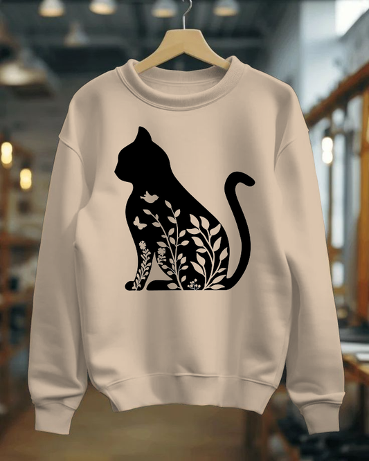 Beige sweatshirt with a black cat design on a hanger in a store setting